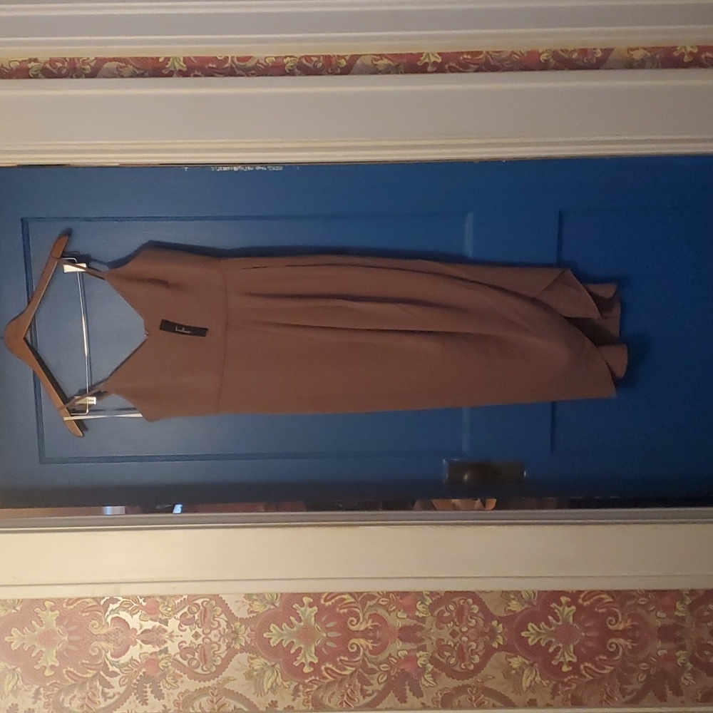 Formal dress from Lulu's color Plum. Size:Medium NWT.